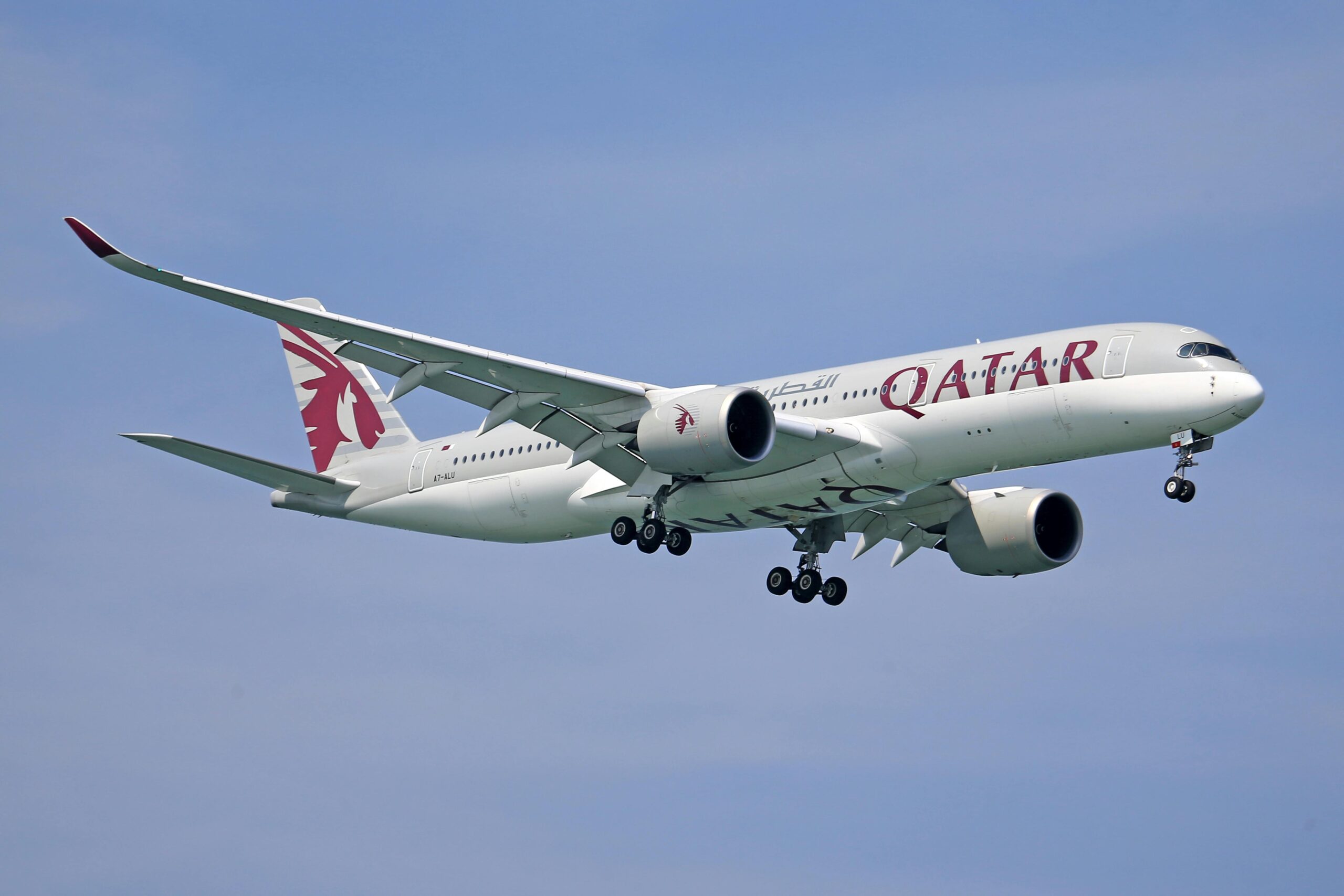 qatar airways plane taking off