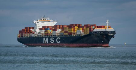 The MSC ship sailing in the sea.
